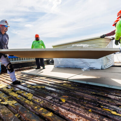 turner roofing team works together on a commercial roof maintenance
