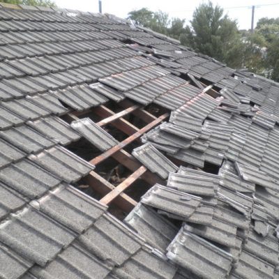 storm damage to roof that needs a replacement