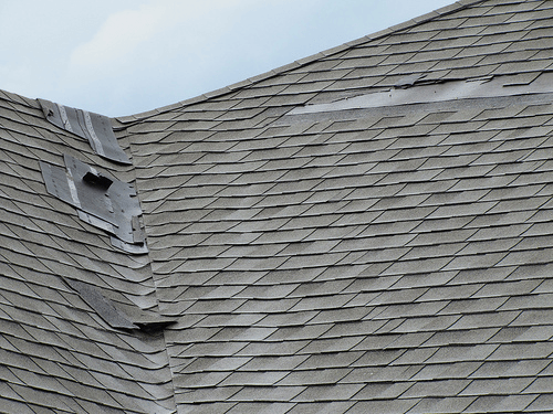 high wind roof damage to shingles